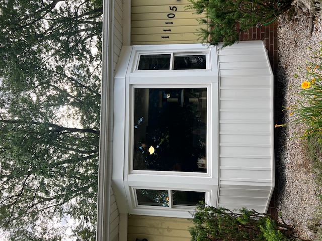 After: Custom Bay Window & Front Re-Side